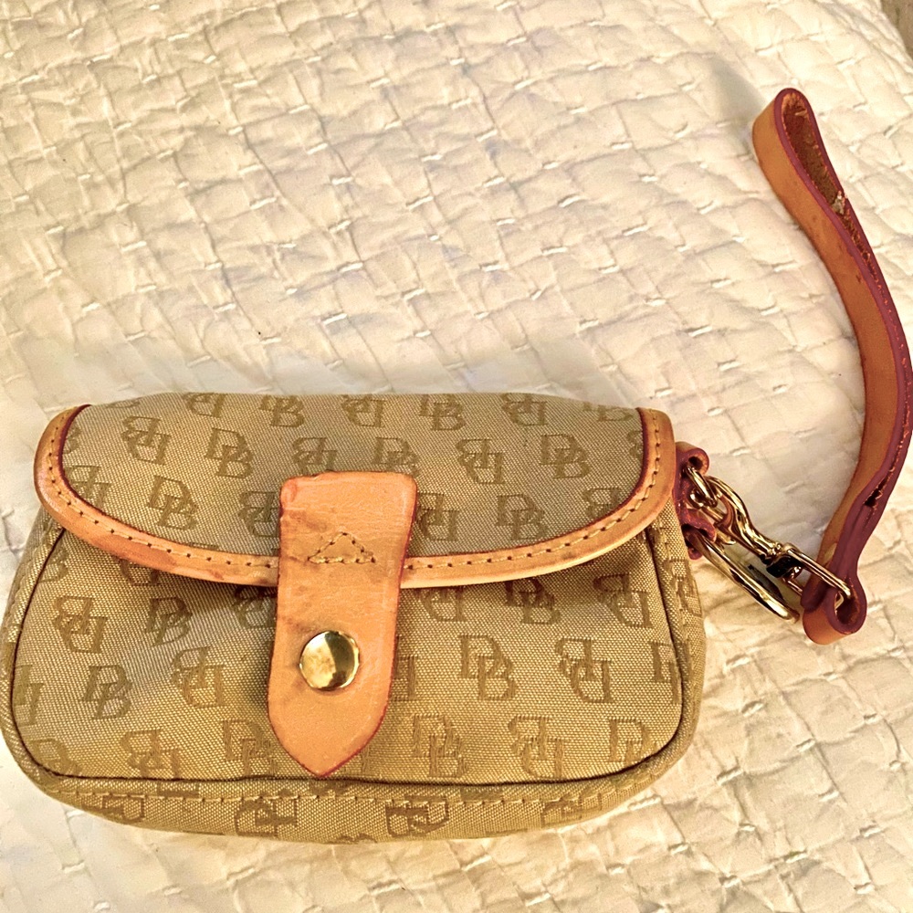 Vintage Dooney  and Bourke Signature Flap Wristlet. Preowned